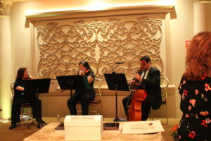 String Trio playing during dinner.
